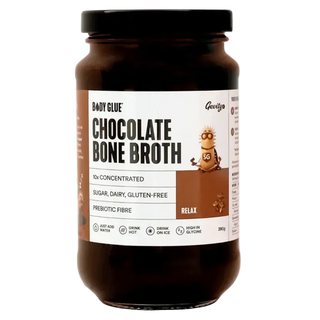Jar of chocolate bone broth with a label on a white background